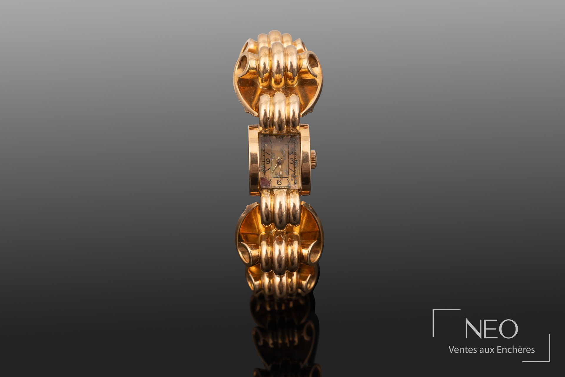 Montre bracelet tank en or jaune