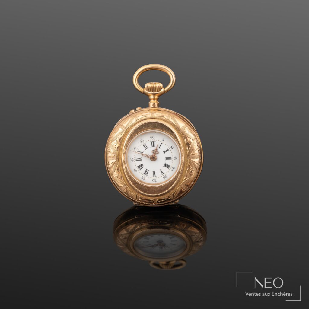 Montre de col en or jaune 18K