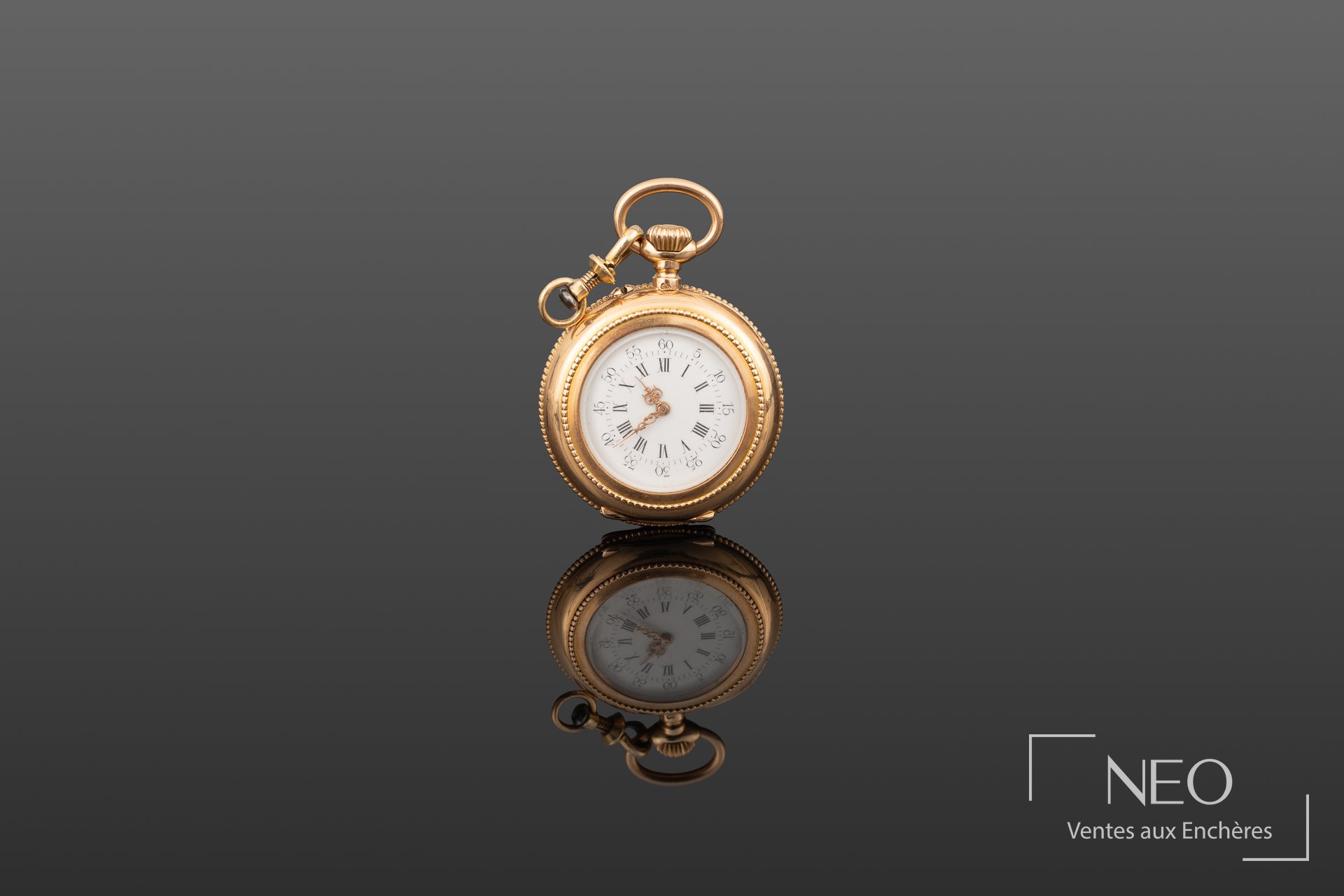 Montre giletière en or jaune 18K