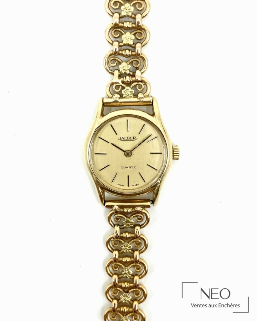 Montre JAEGER en or jaune avec cadran doré et bracelet Art Nouveau ajouré