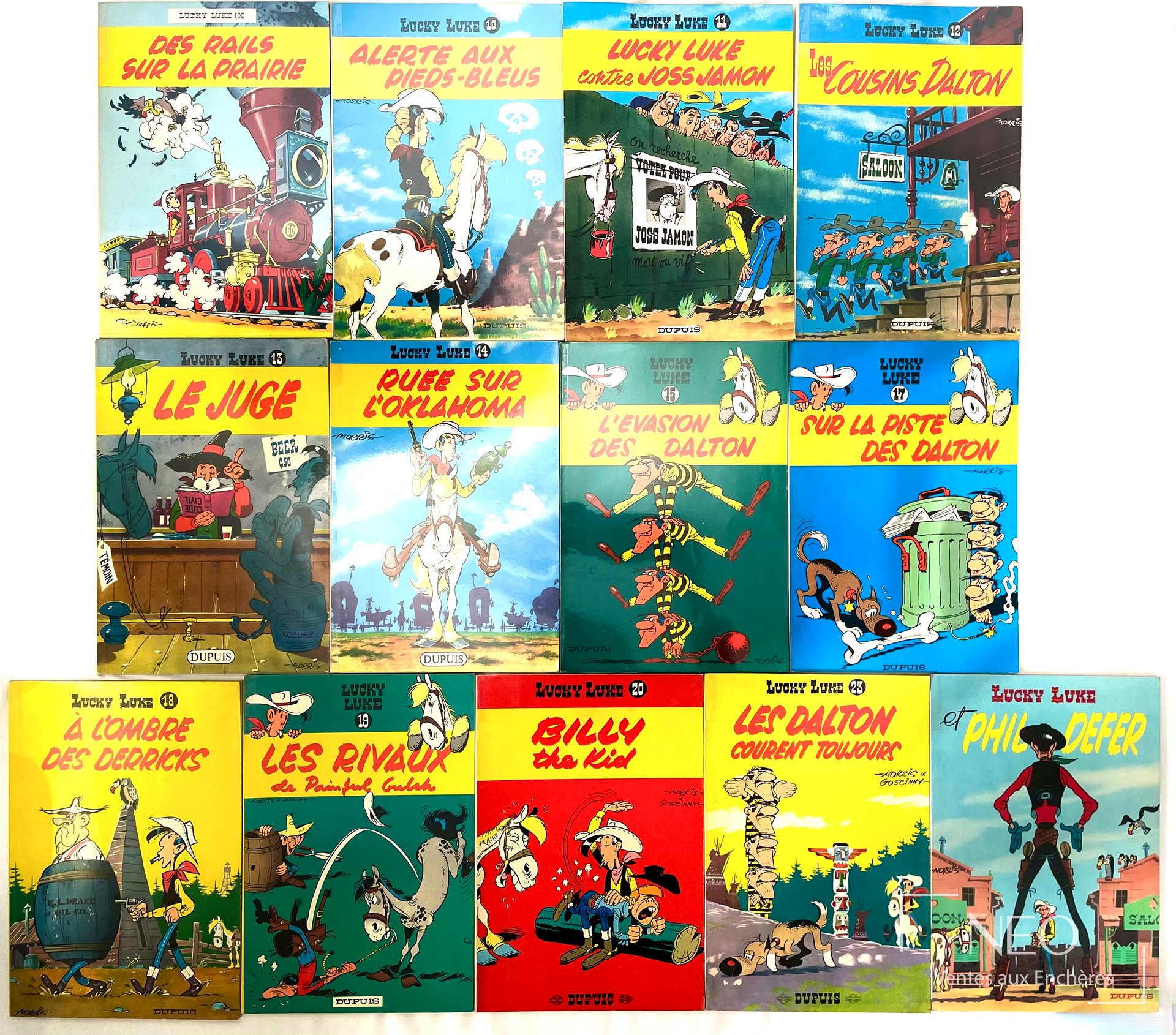 Lot de treize albums Lucky Luke en réédition dos jaune