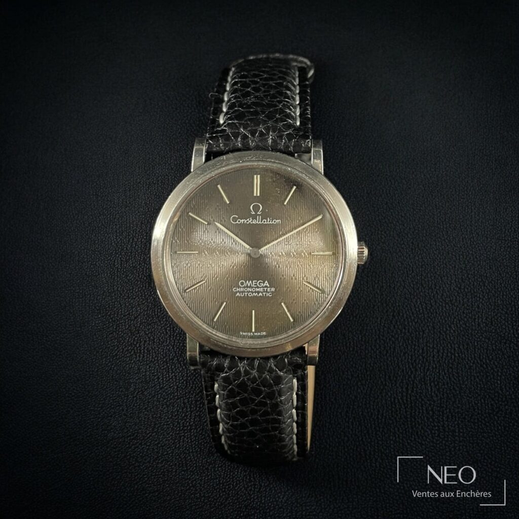 Montre Omega Constellation en acier sur bracelet bleu