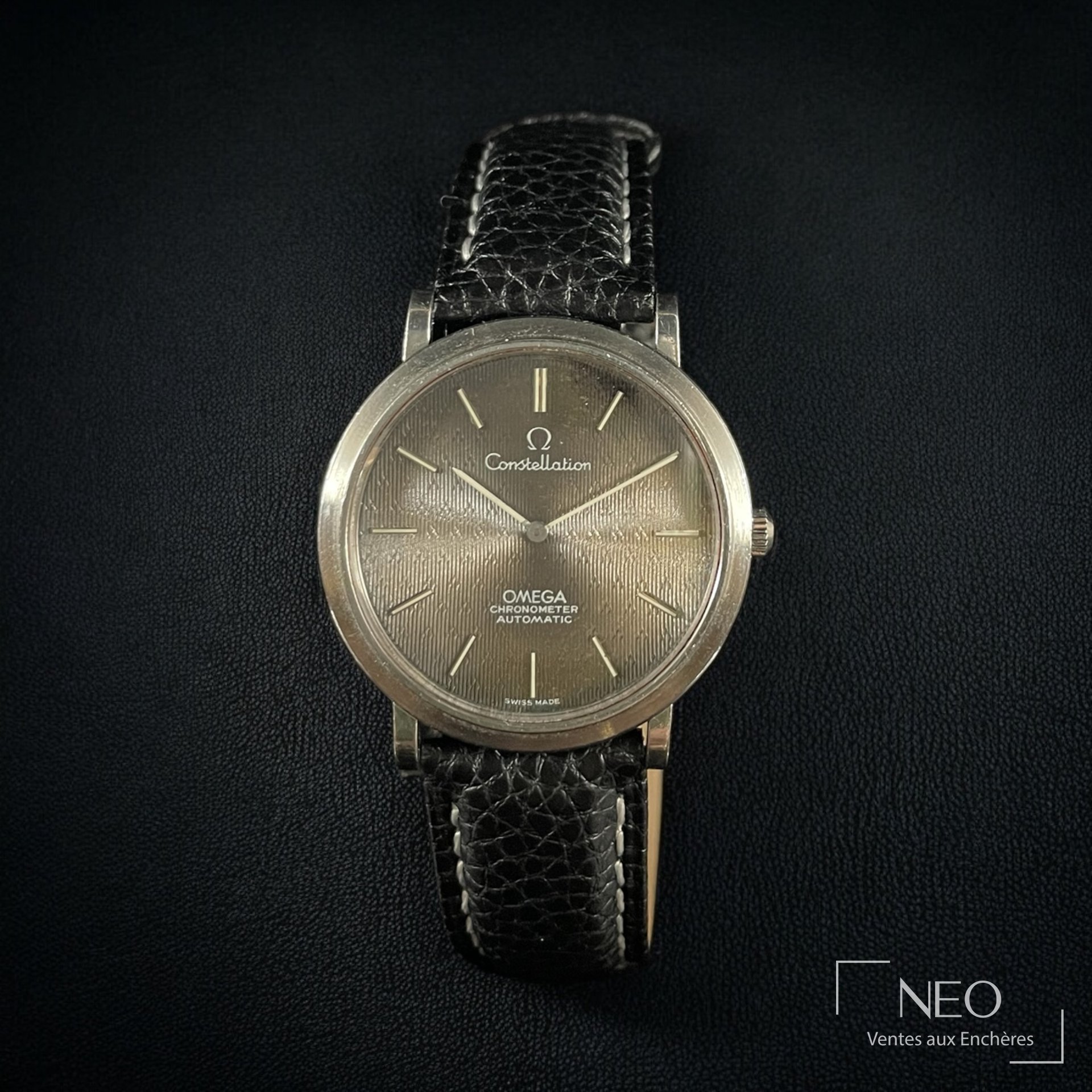 Montre Omega Constellation en acier sur bracelet bleu