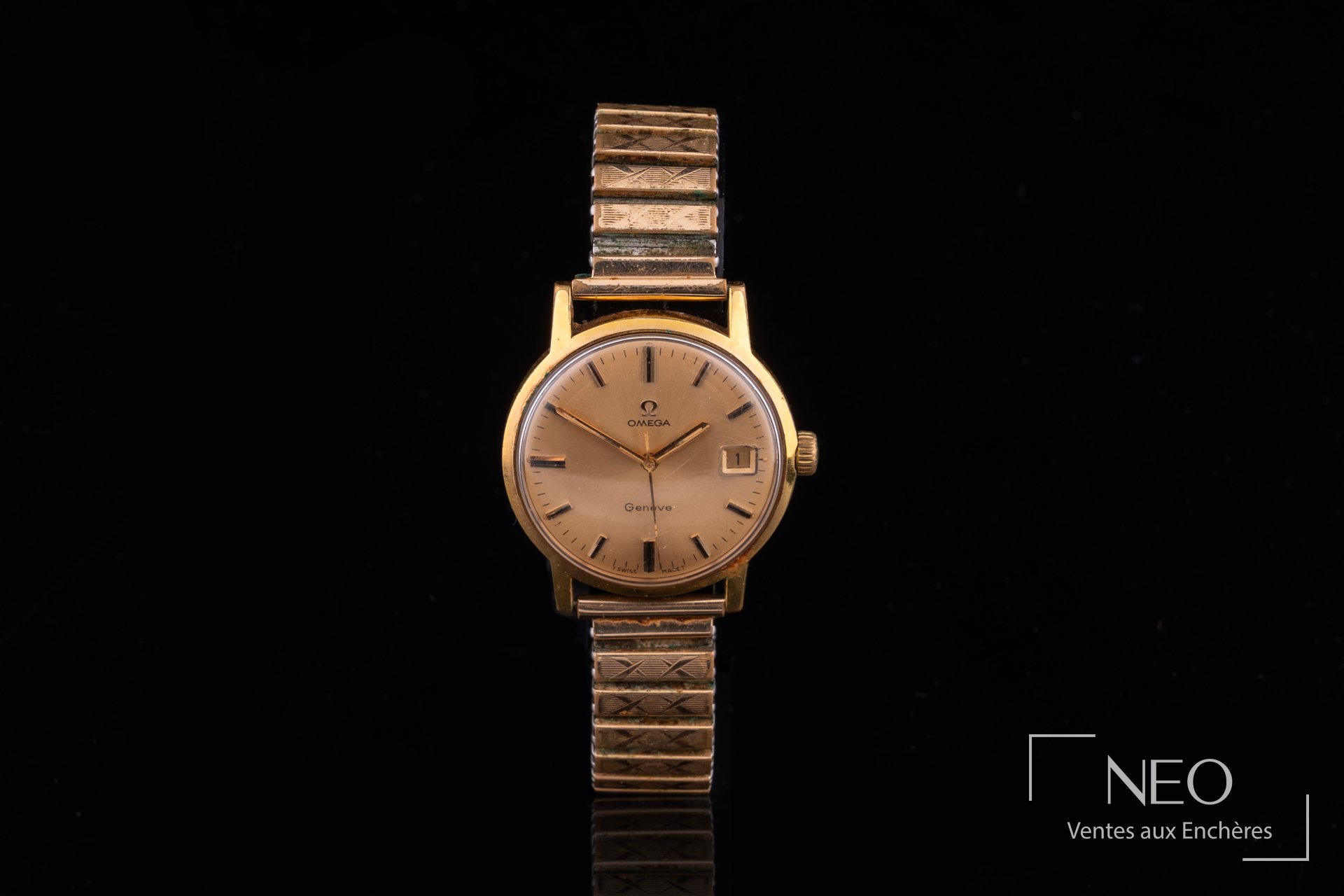 Montre Omega Genève en plaqué or avec cadran doré