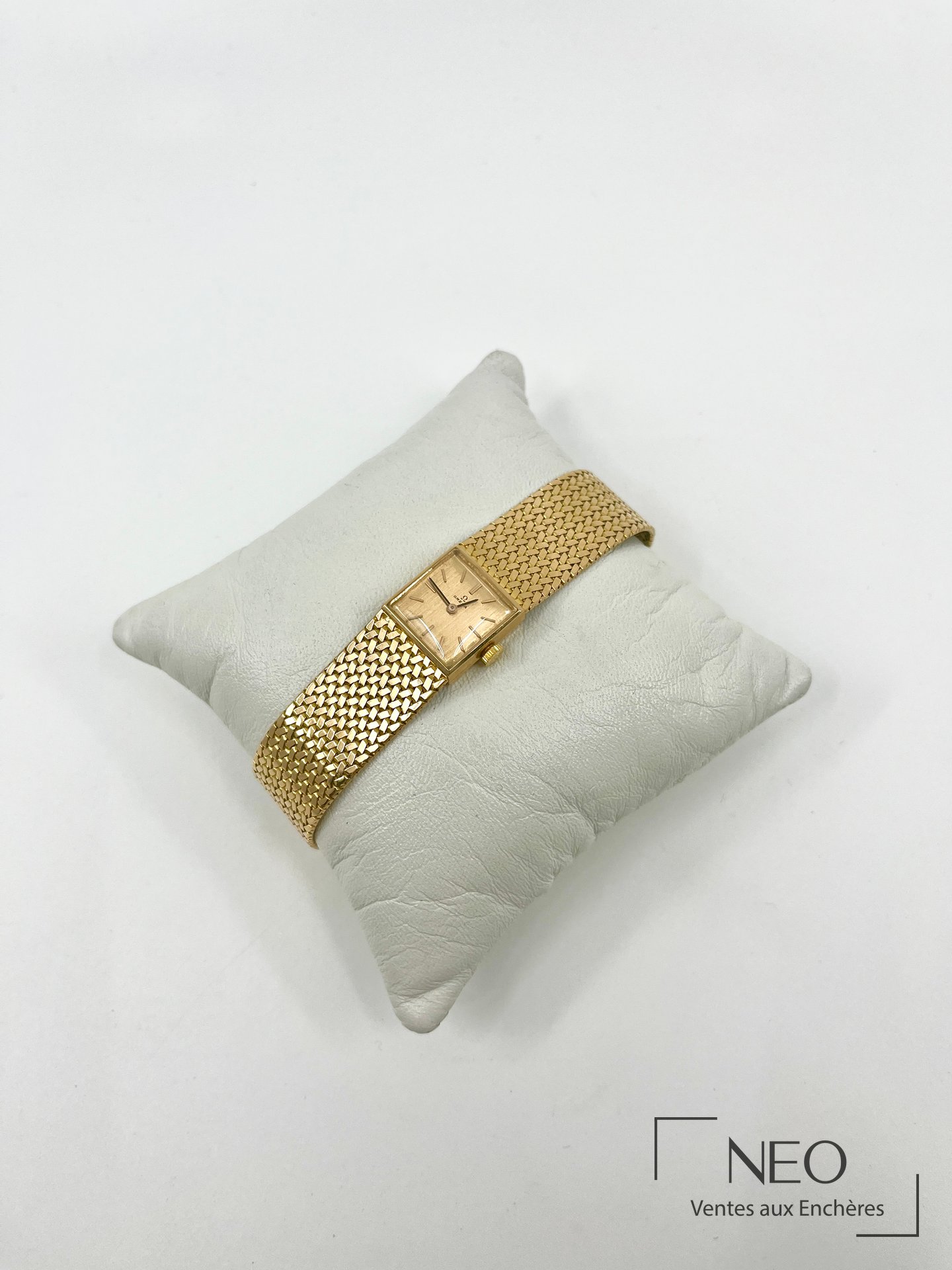 Omega montre de dame en or jaune, cadran carré, bracelet maille