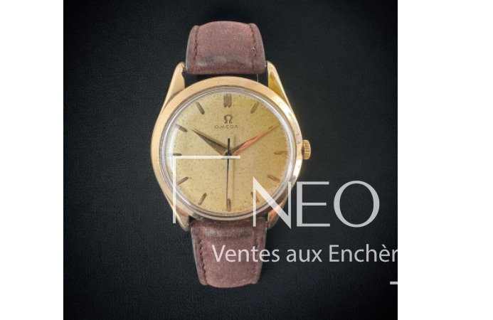 Montre OMEGA de ville en or jaune avec cadran patiné et bracelet cuir marron