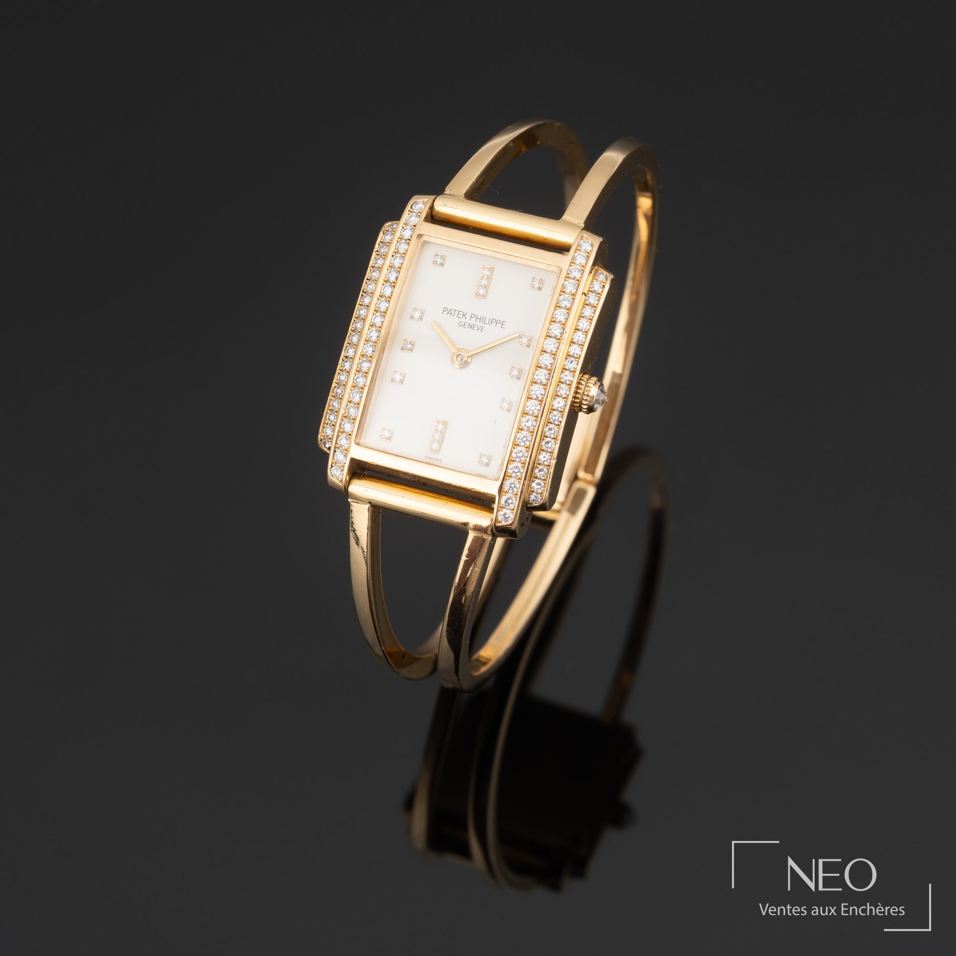 Montre Patek Philippe Gondolo rectangulaire en or jaune sertie de diamants