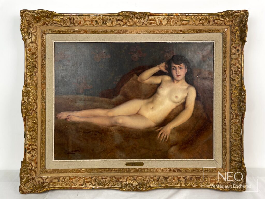 Huile sur toile de Paul Sieffert représentant une femme nue allongée dans un cadre doré.