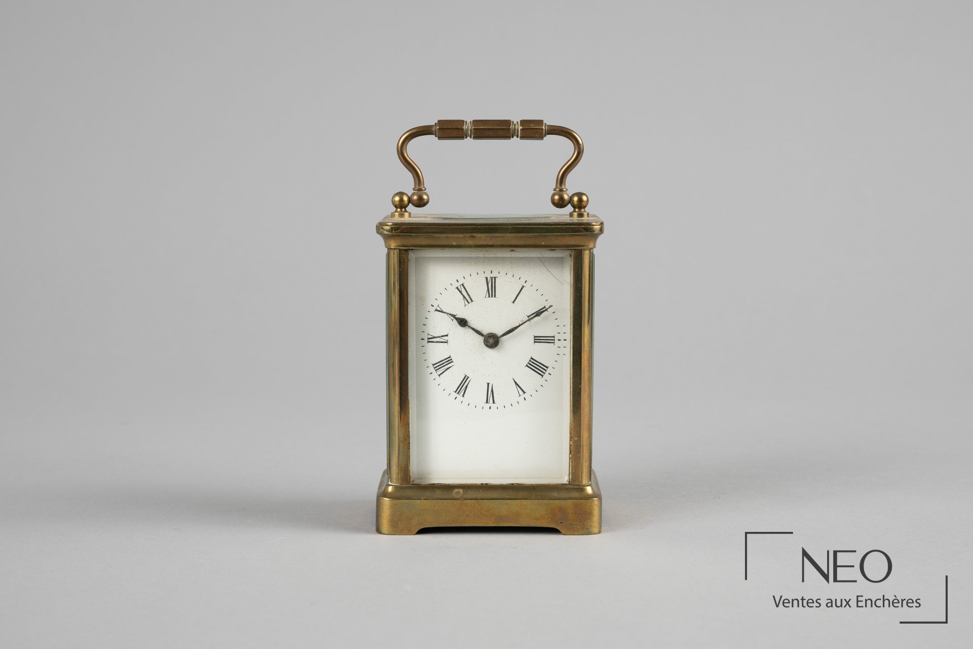 Pendulette d'officier en laiton doré