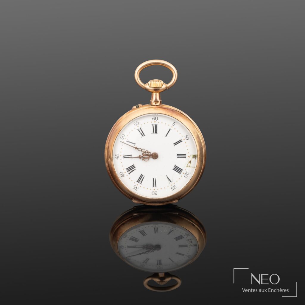 Montre à gousset en or jaune avec cadran émaillé blanc et chiffres romains