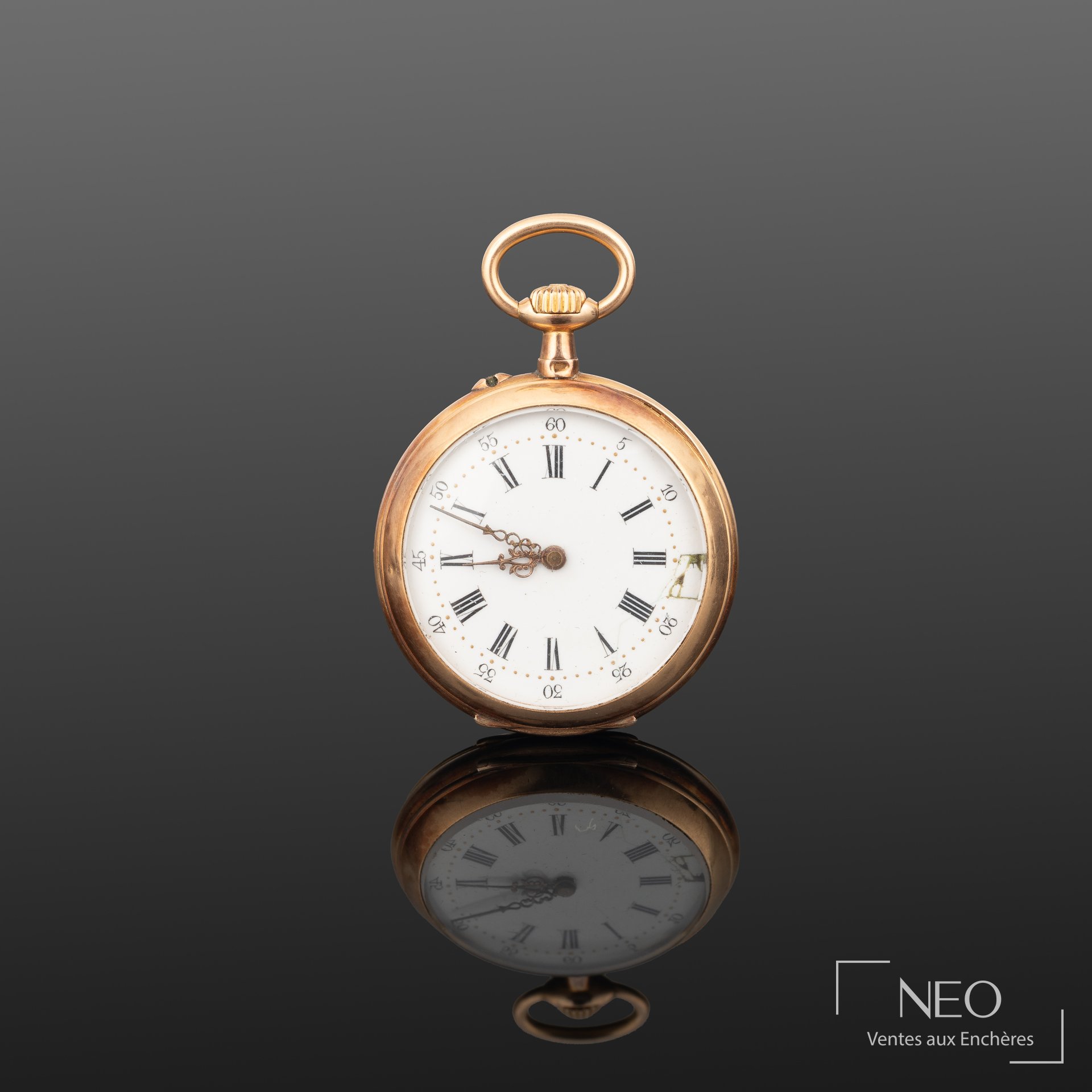 Montre à gousset en or jaune avec cadran émaillé blanc et chiffres romains