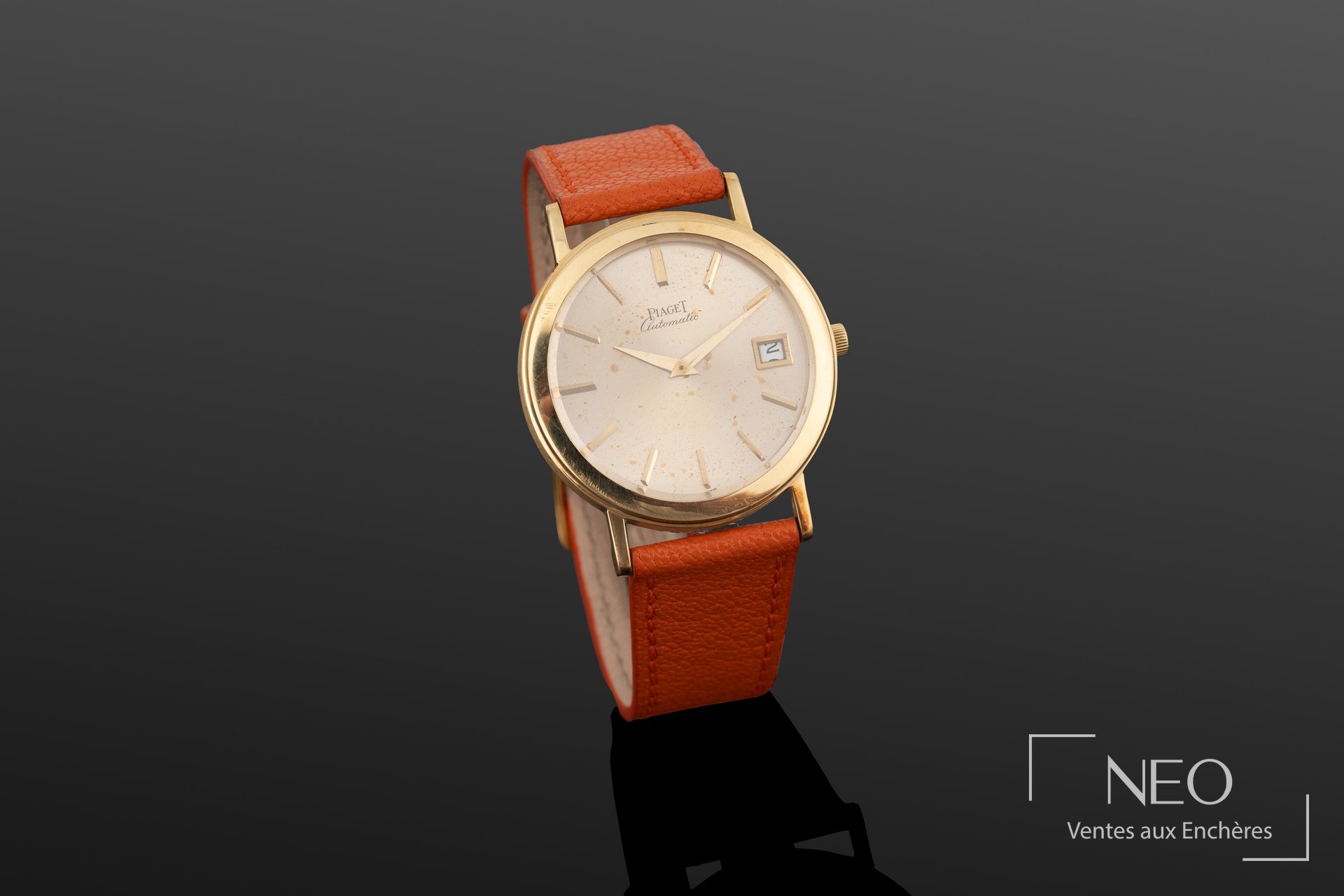Montre Piaget Altiplano automatique en or jaune avec cadran doré et bracelet orange