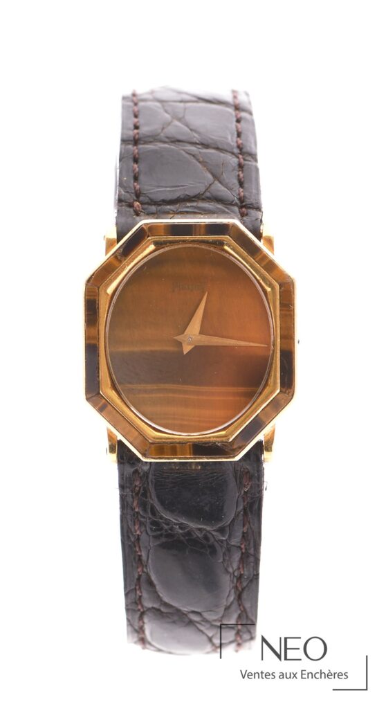 Montre bracelet Piaget en or jaune avec cadran œil-de-tigre et bracelet en cuir