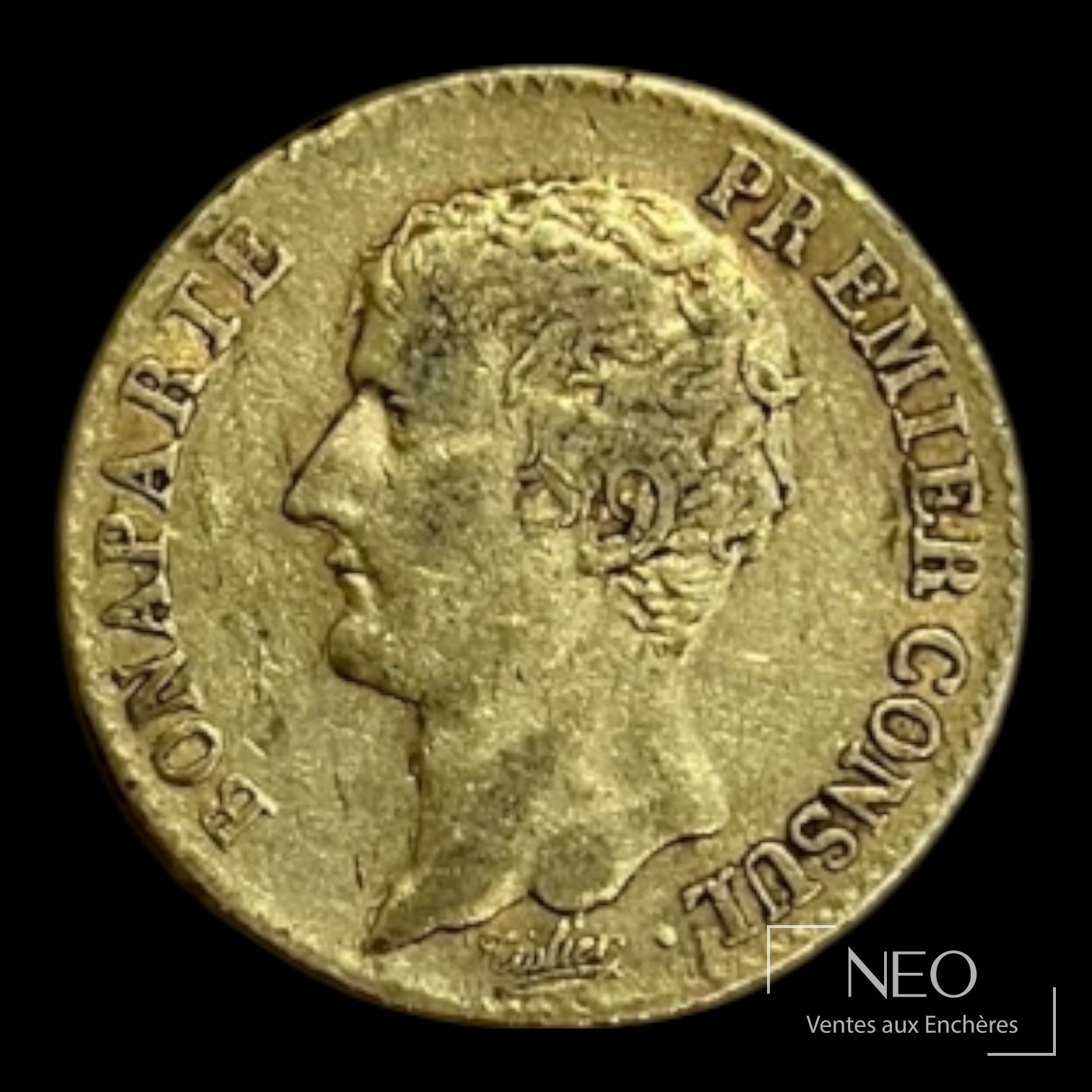Avers d'une pièce de 20 francs or Bonaparte Ier Consul avec profil à gauche et légende circulaire