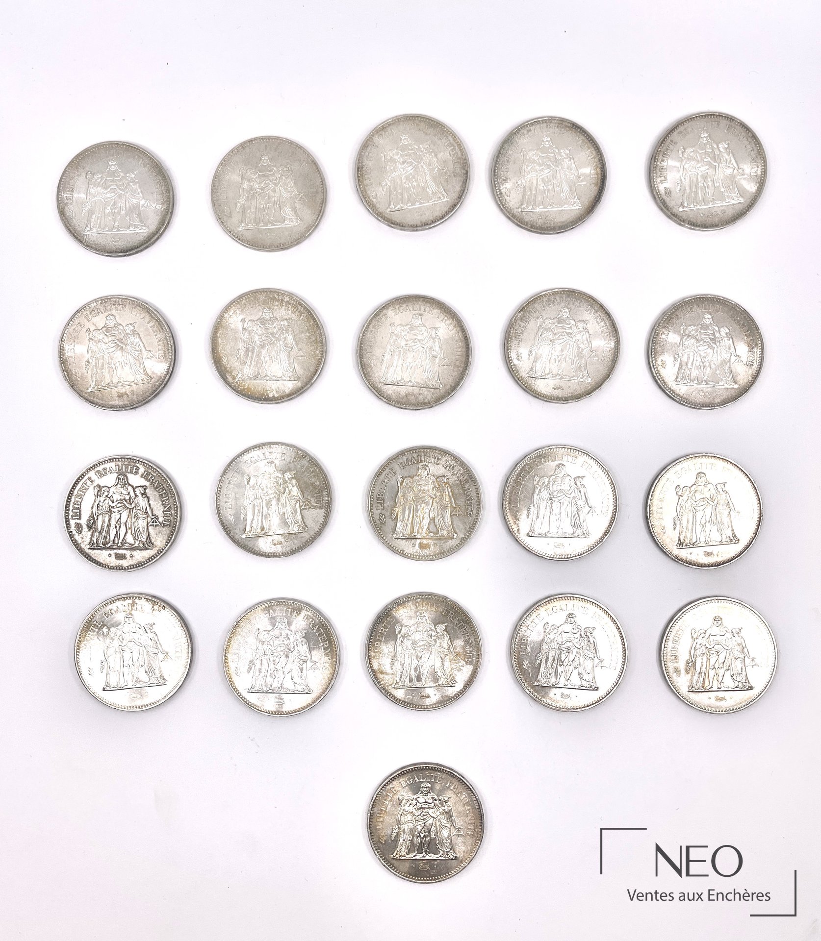 Lot de vingt et une pièces en argent de 50 francs 1975 à 1978