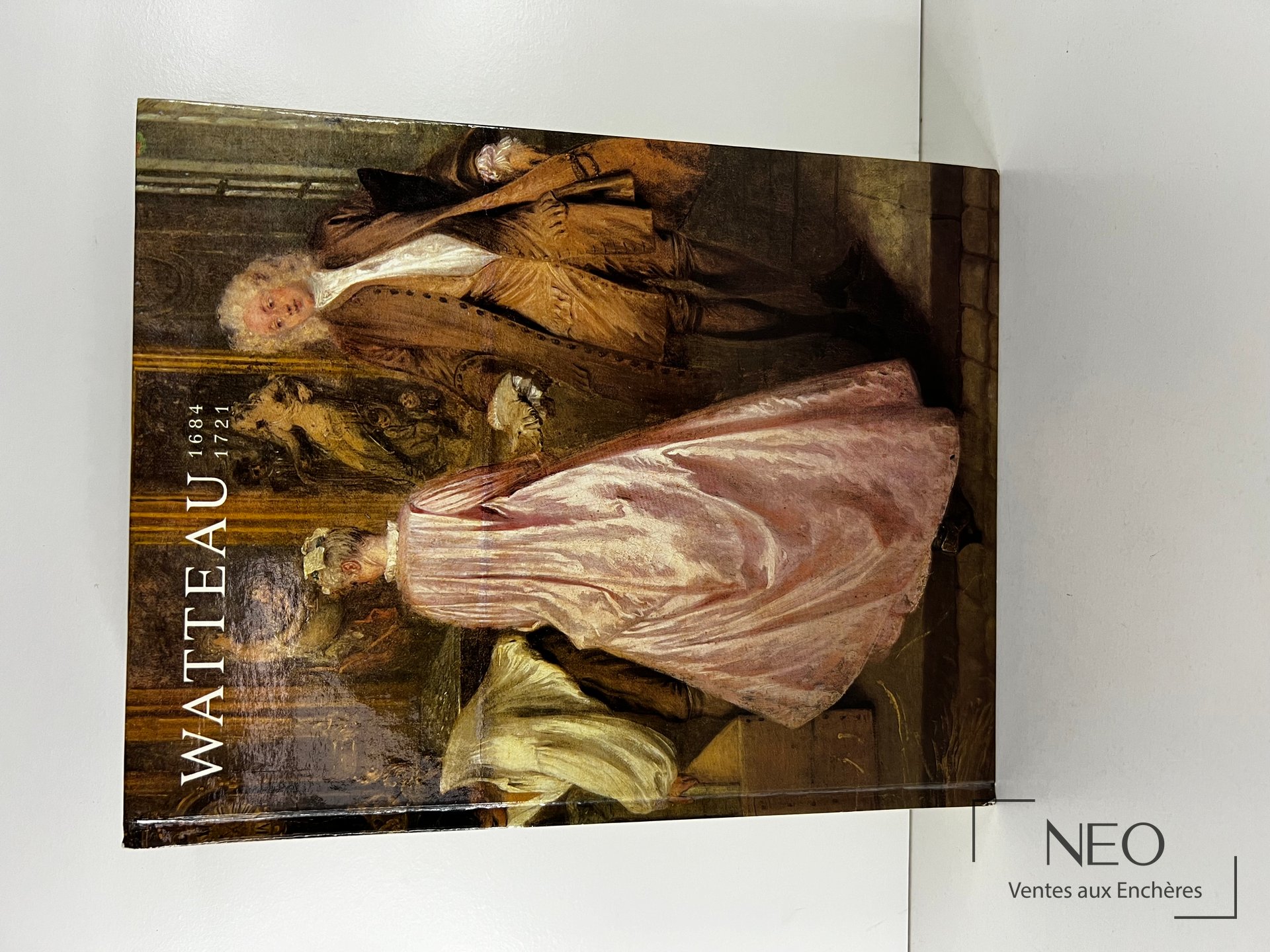 Couverture illustrée du catalogue Watteau avec scène peinte et titre en grandes lettres.