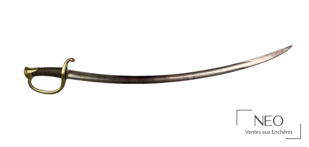 Sabre de cannonier à lame courbe et garde en laiton