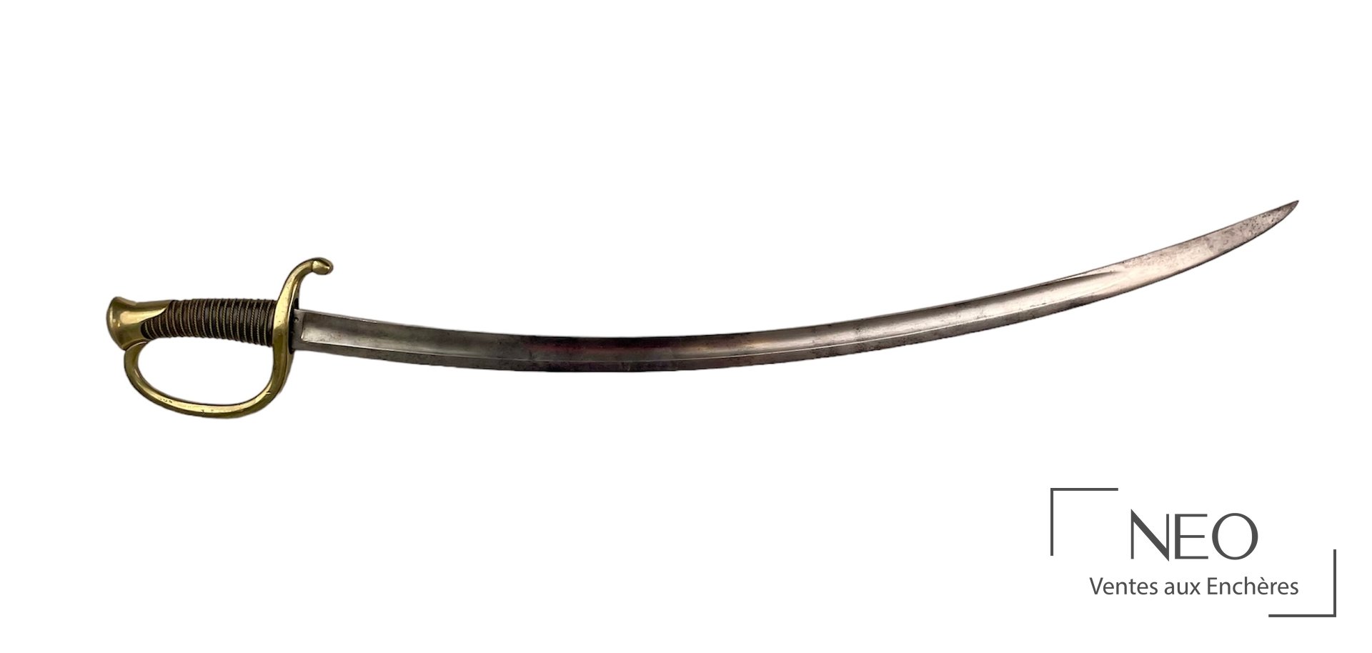 Sabre de cannonier à lame courbe et garde en laiton