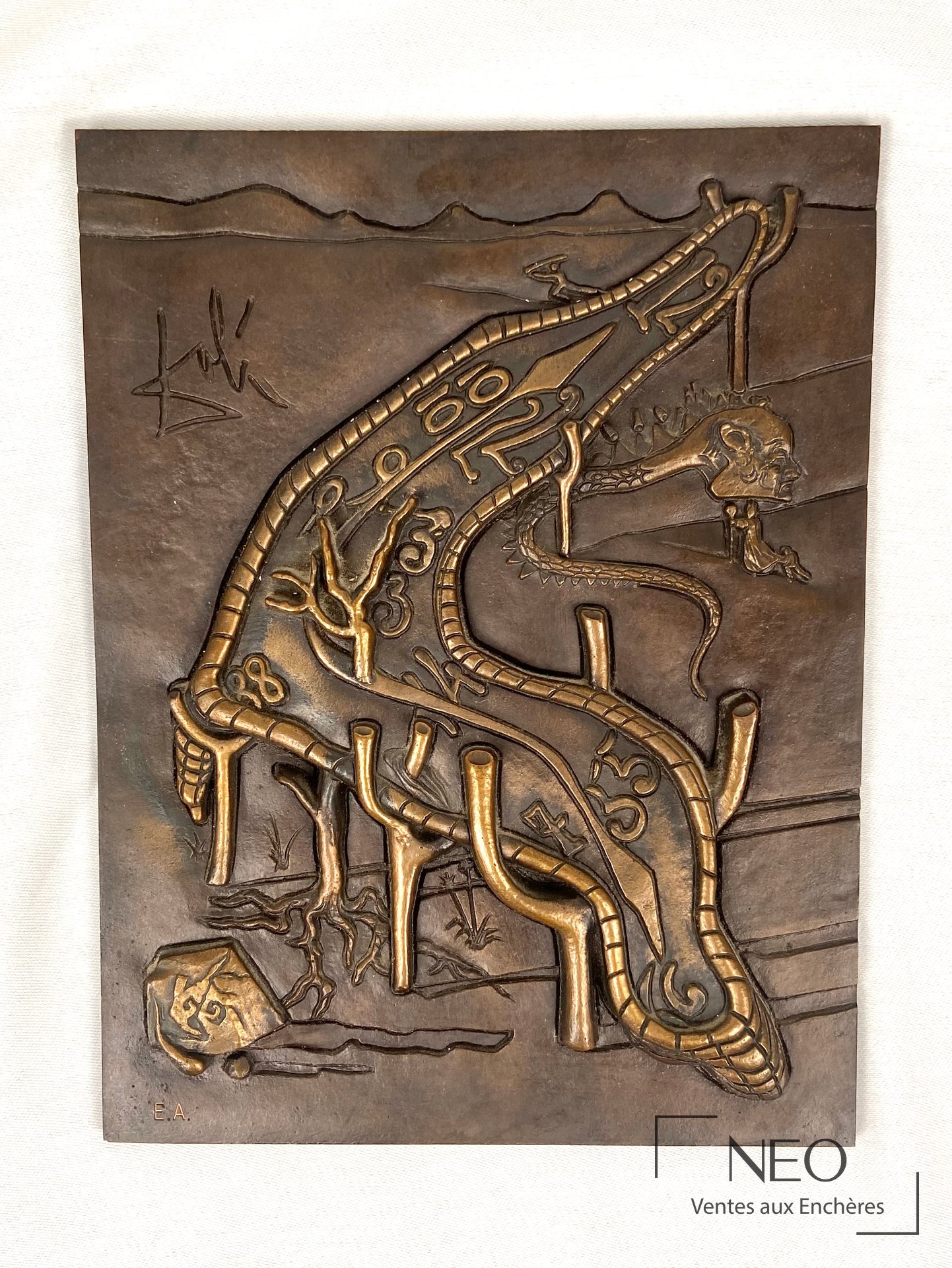 Bronze de Salvador Dali à patine brune-dorée