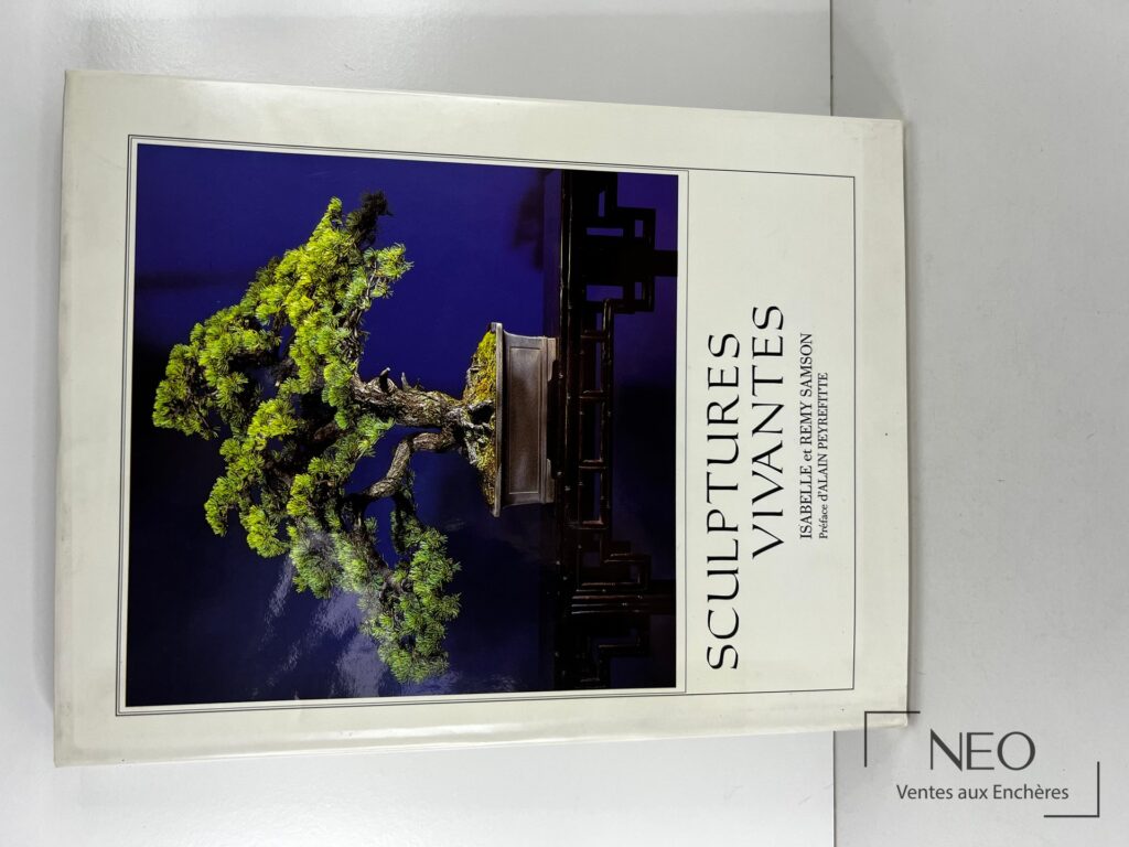 Couverture du livre Sculptures Vivantes de SAMSON avec une sculpture végétale sur fond bleu