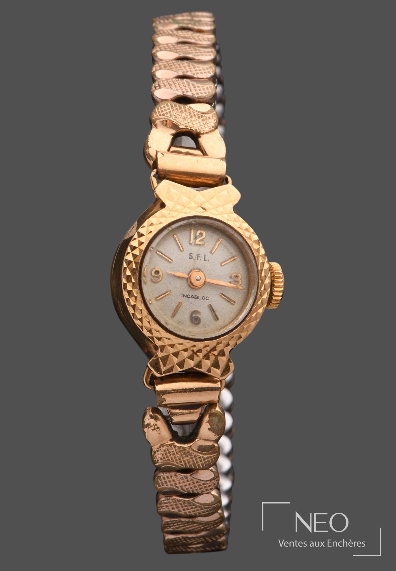 SFL montre bracelet, boîtier losangique en or jaune 18 carats