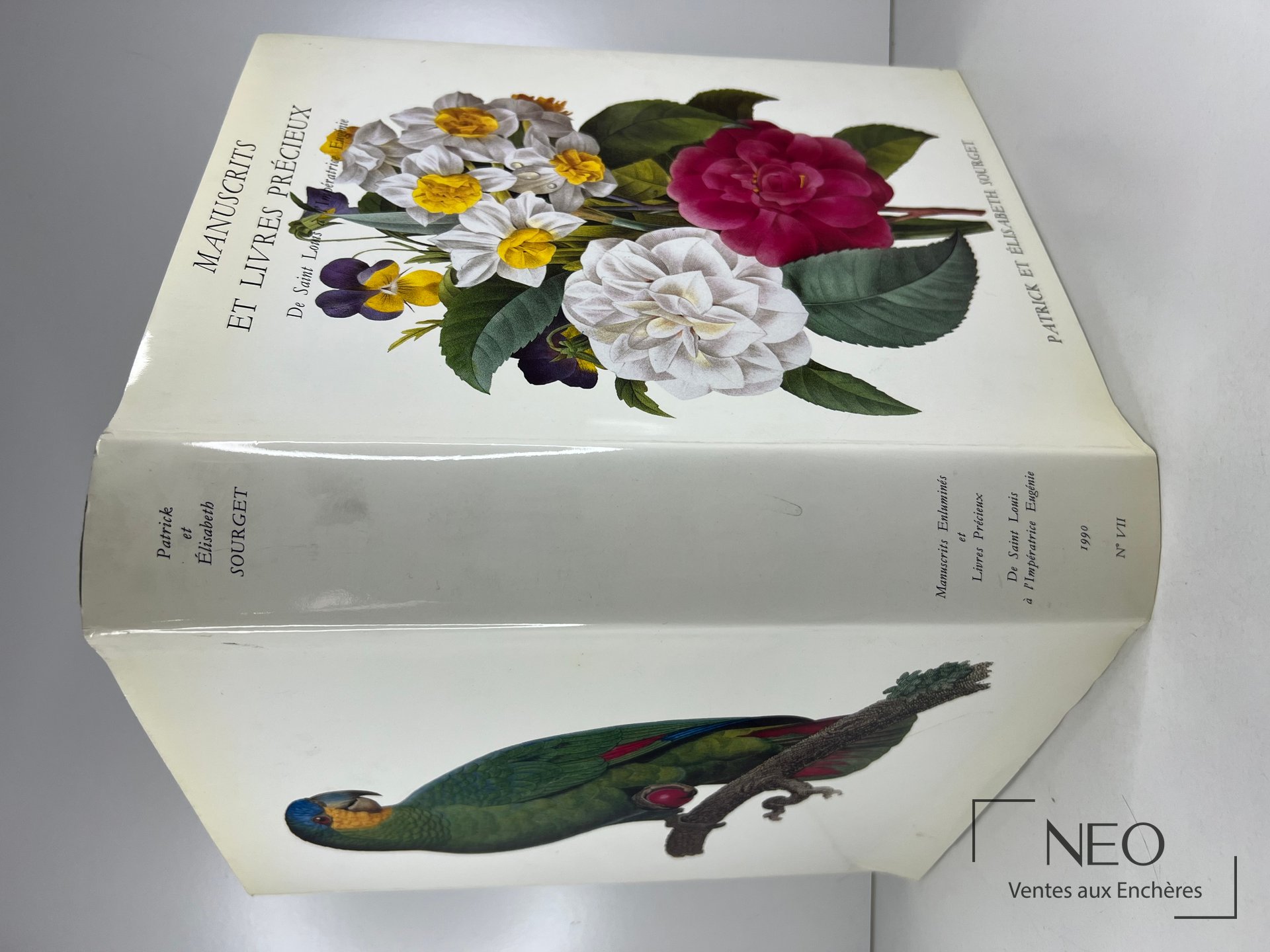 Couverture illustrée d'un catalogue Sourget avec bouquet de fleurs et oiseau