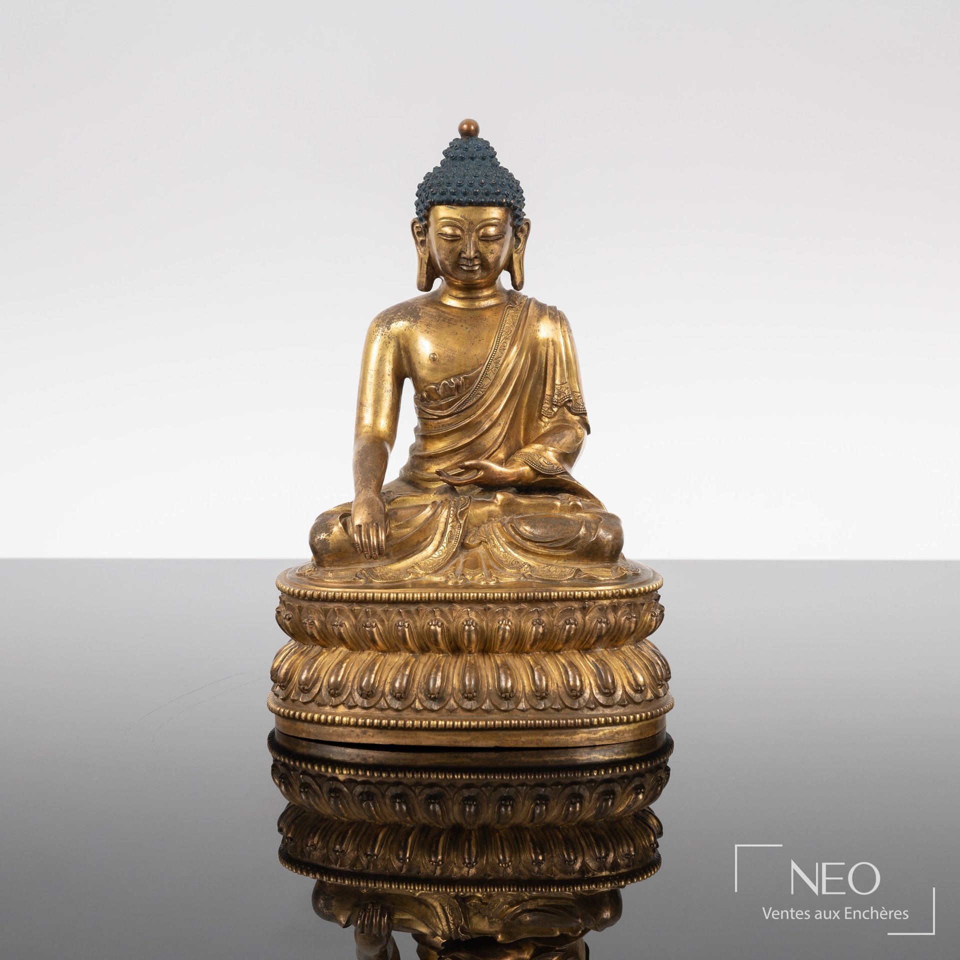 Statuette de Buddha en bronze doré