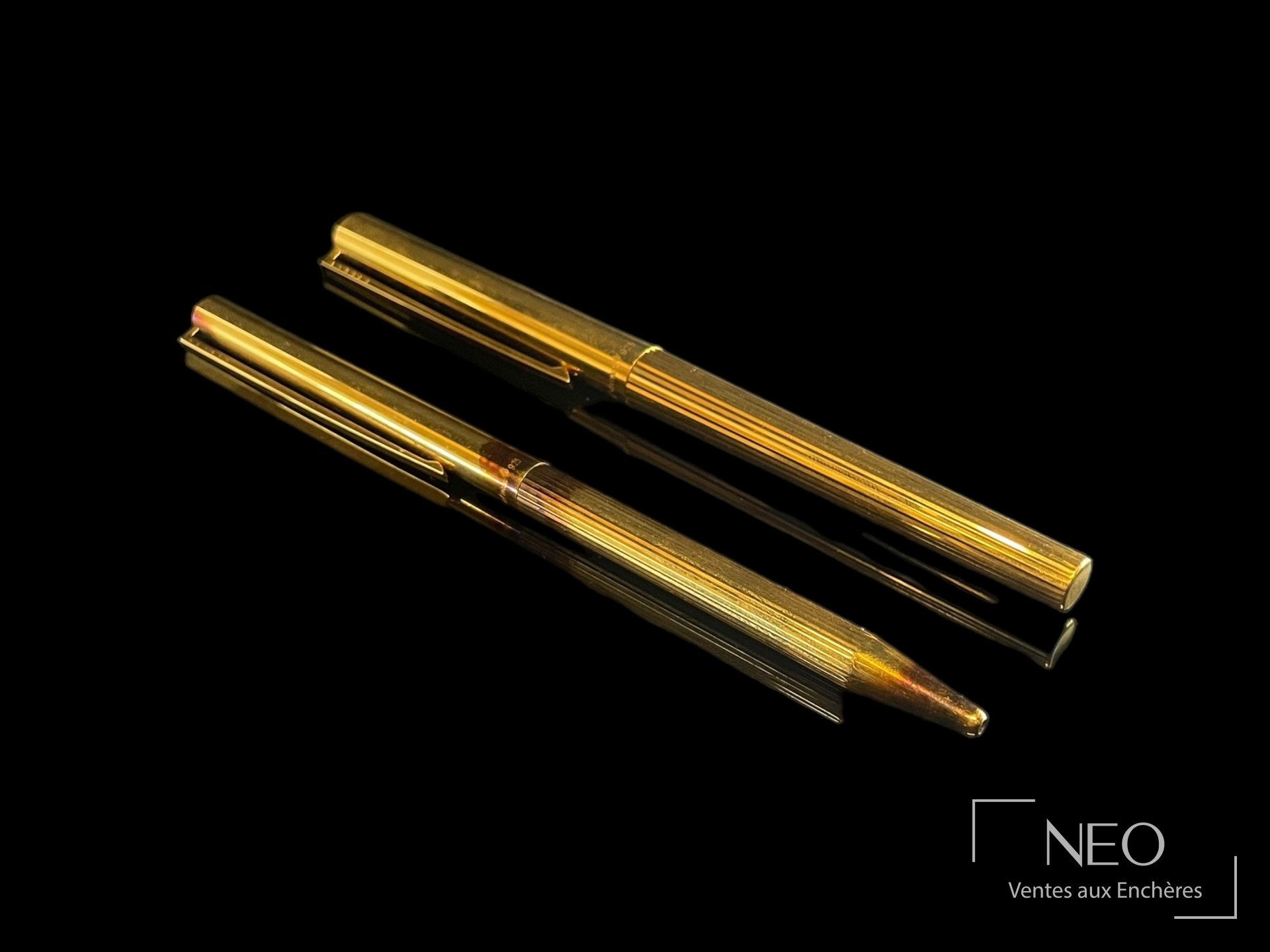 Stylos billes Dupont en vermeil et résine rouge, époque non précisée