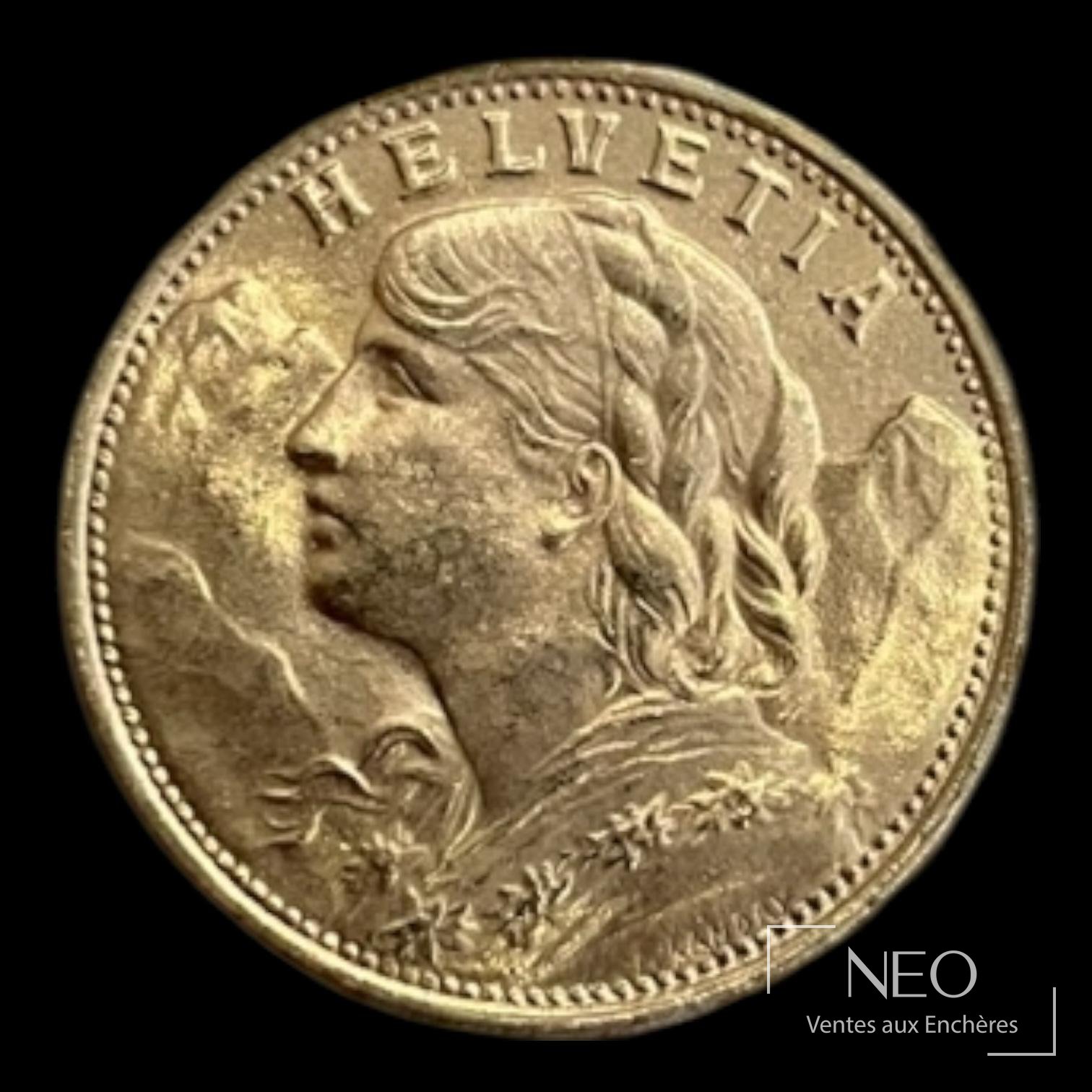 Avers d’une pièce suisse de 20 francs or avec buste de femme et inscription Helvetica.