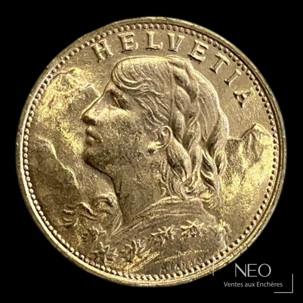 Avers d'une pièce suisse en or avec buste de profil et légende HELVETIA.