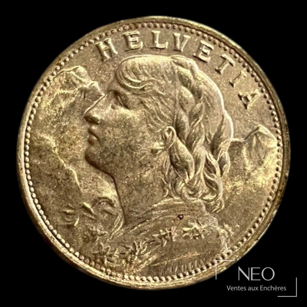 Avers d'une pièce suisse de 20 francs or avec profil féminin et inscription HELVETIA