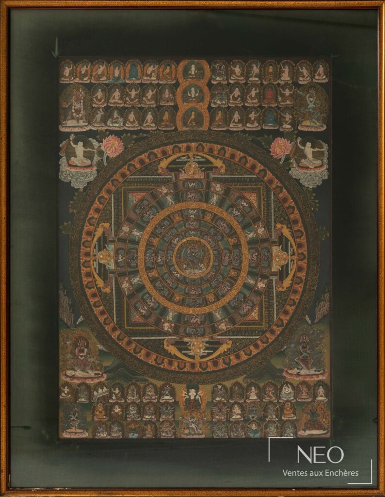 Thangka cosmologique népalais encadré sous verre