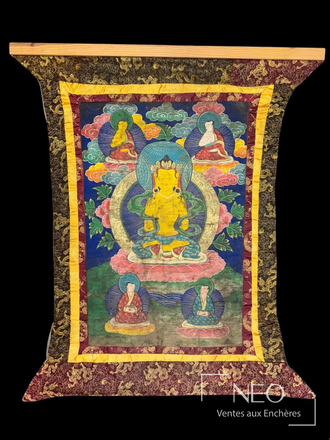 Thangka tibétain représentant un buddha assis entouré de sages