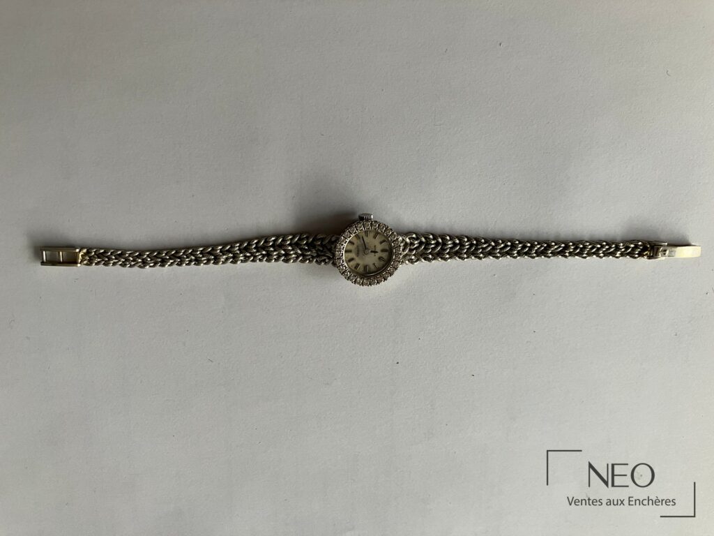 Montre-bracelet Tissot de dame en or gris avec bracelet tressé et couronne sertie