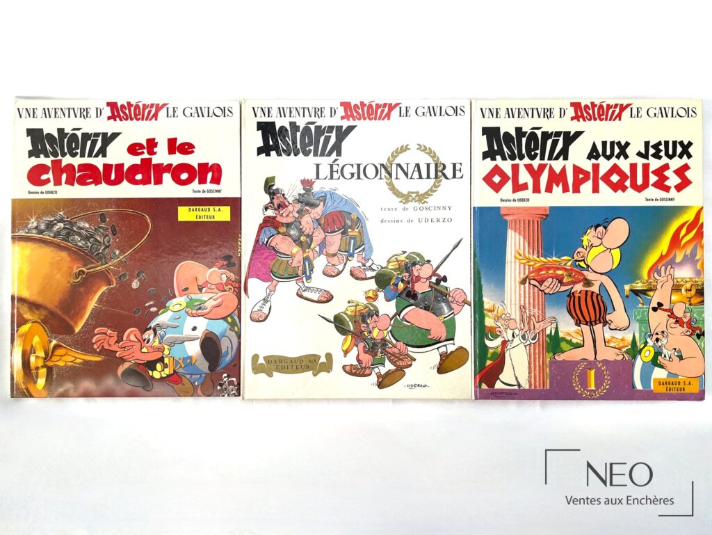 Les trois albums Astérix de face