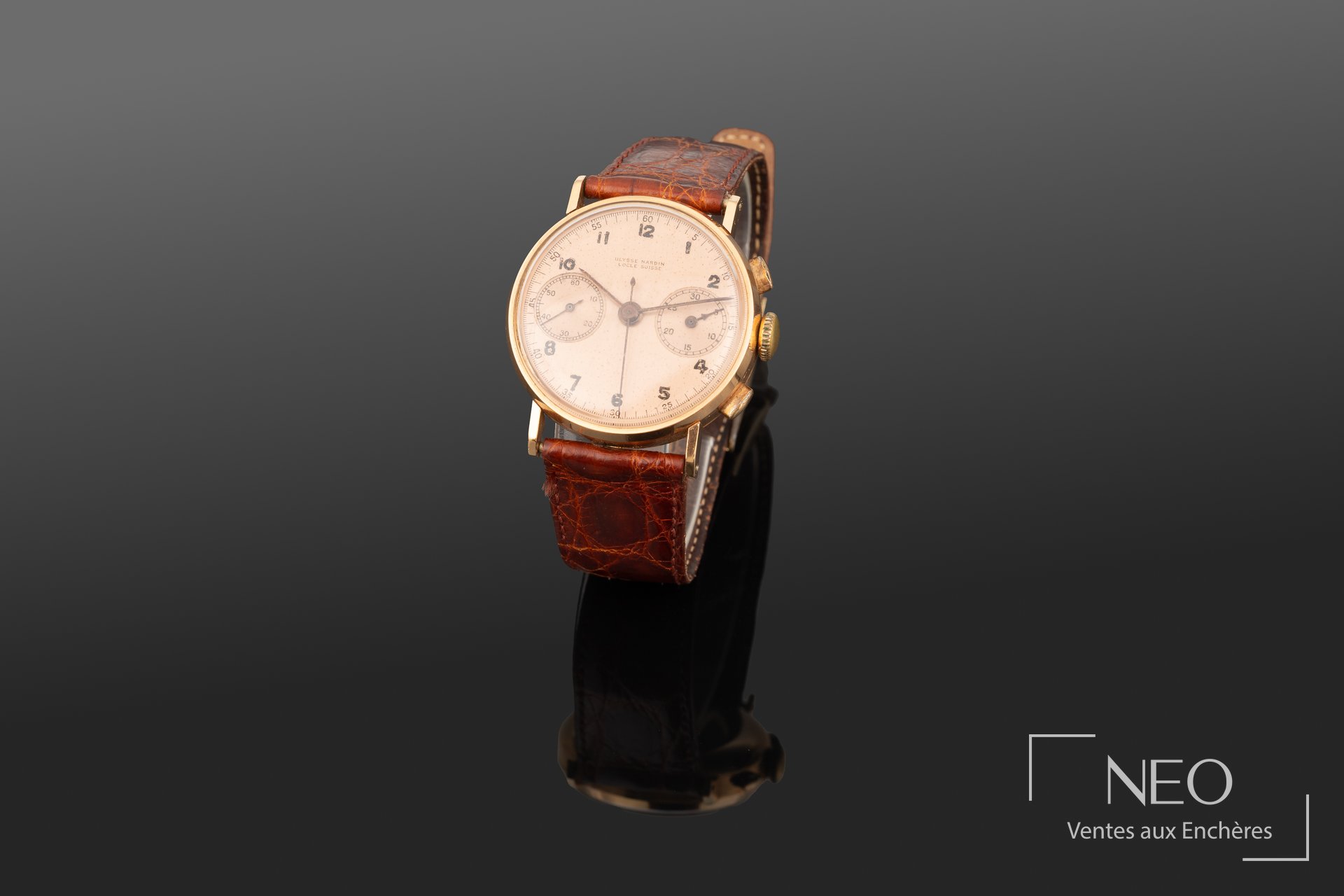 Montre Ulysse Nardin chronographe en or rose avec cadran cuivre et bracelet cuir