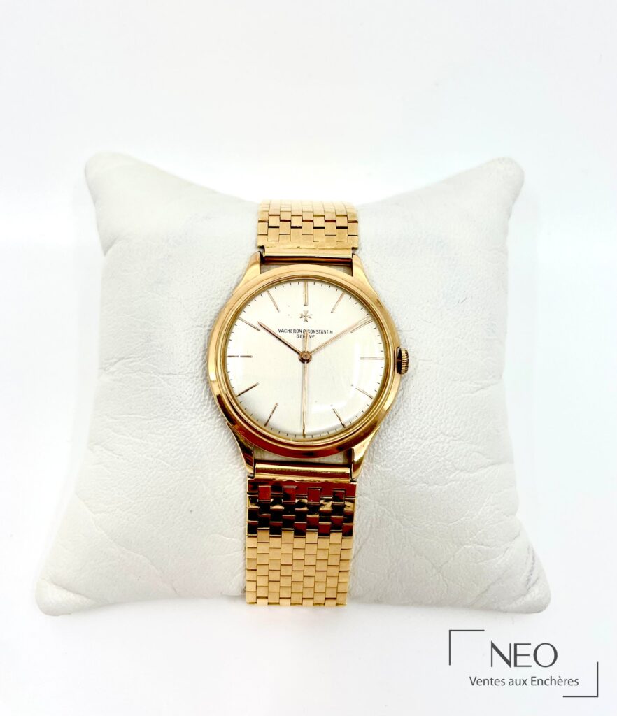 Montre Vacheron Constantin en or rose avec cadran clair et bracelet or jaune à maille briquette