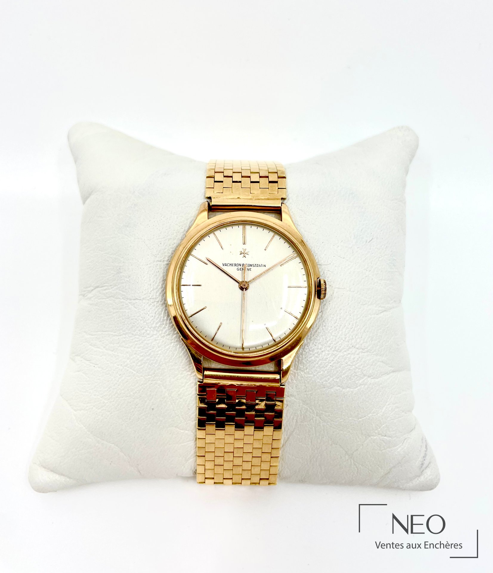 Montre Vacheron Constantin en or rose avec cadran clair et bracelet or jaune à maille briquette