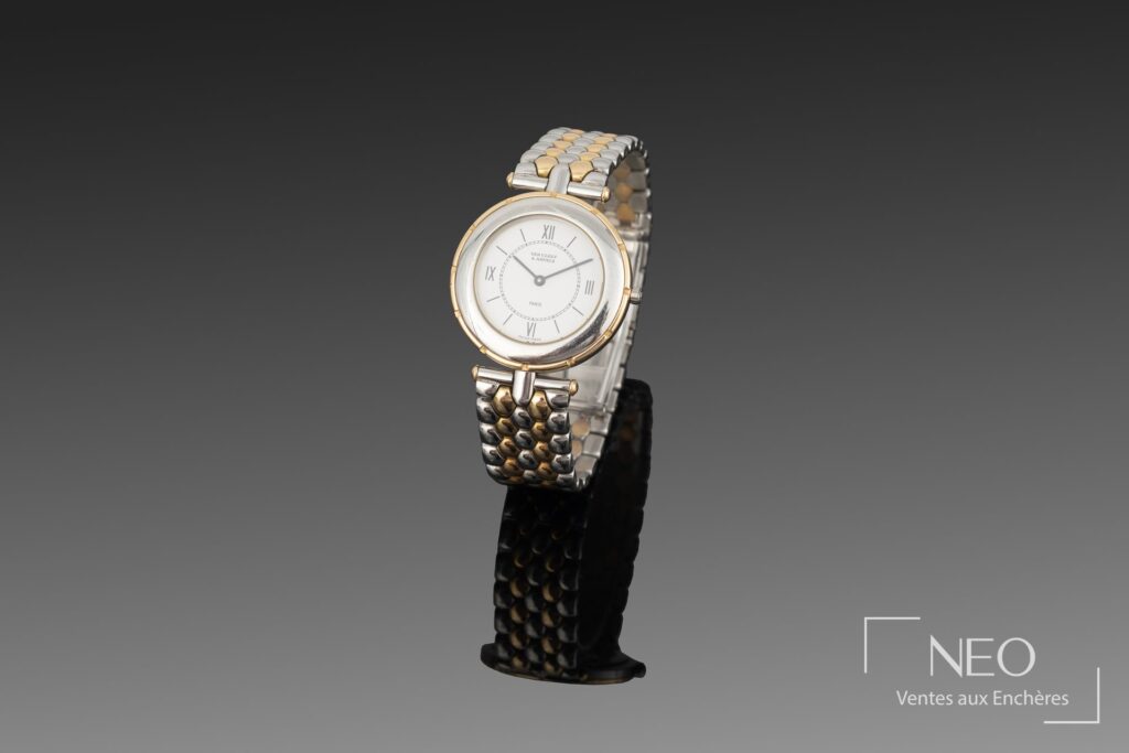 Montre bracelet Van Cleef & Arpels en acier et or jaune