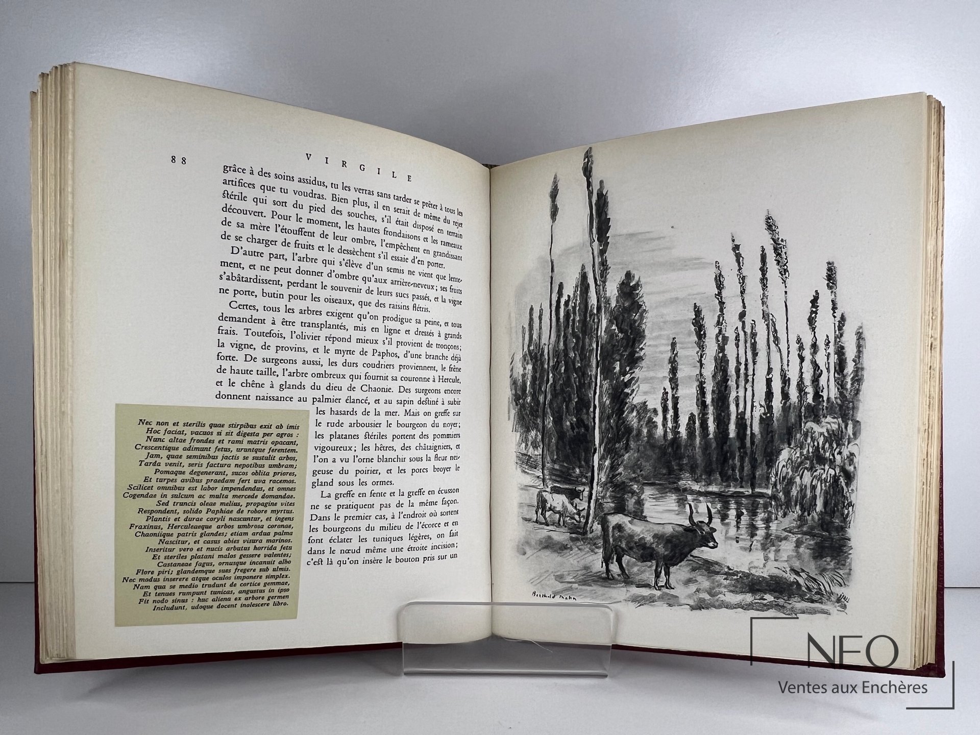 Livre ouvert montrant une page illustrée et une page de texte avec la signature de Berthold Mahn