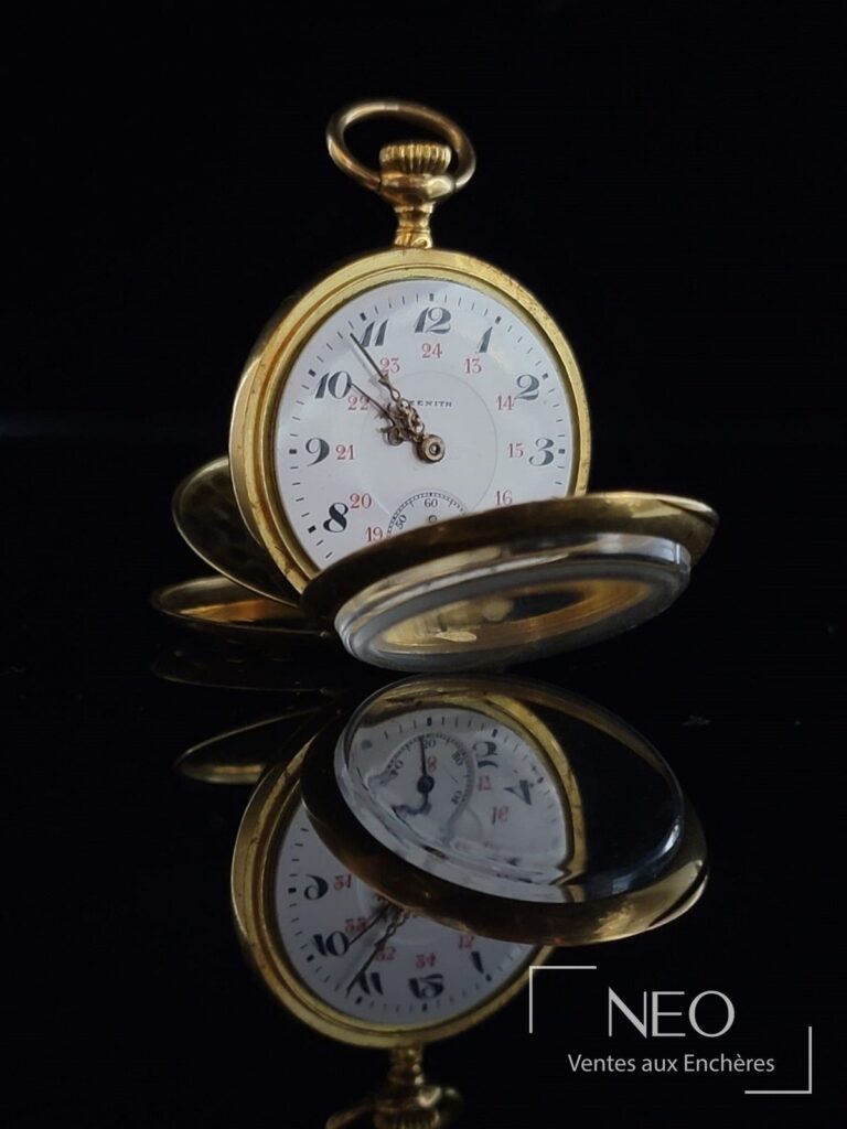 Montre de poche ZENITH en or jaune avec cadran émaillé blanc et petite seconde