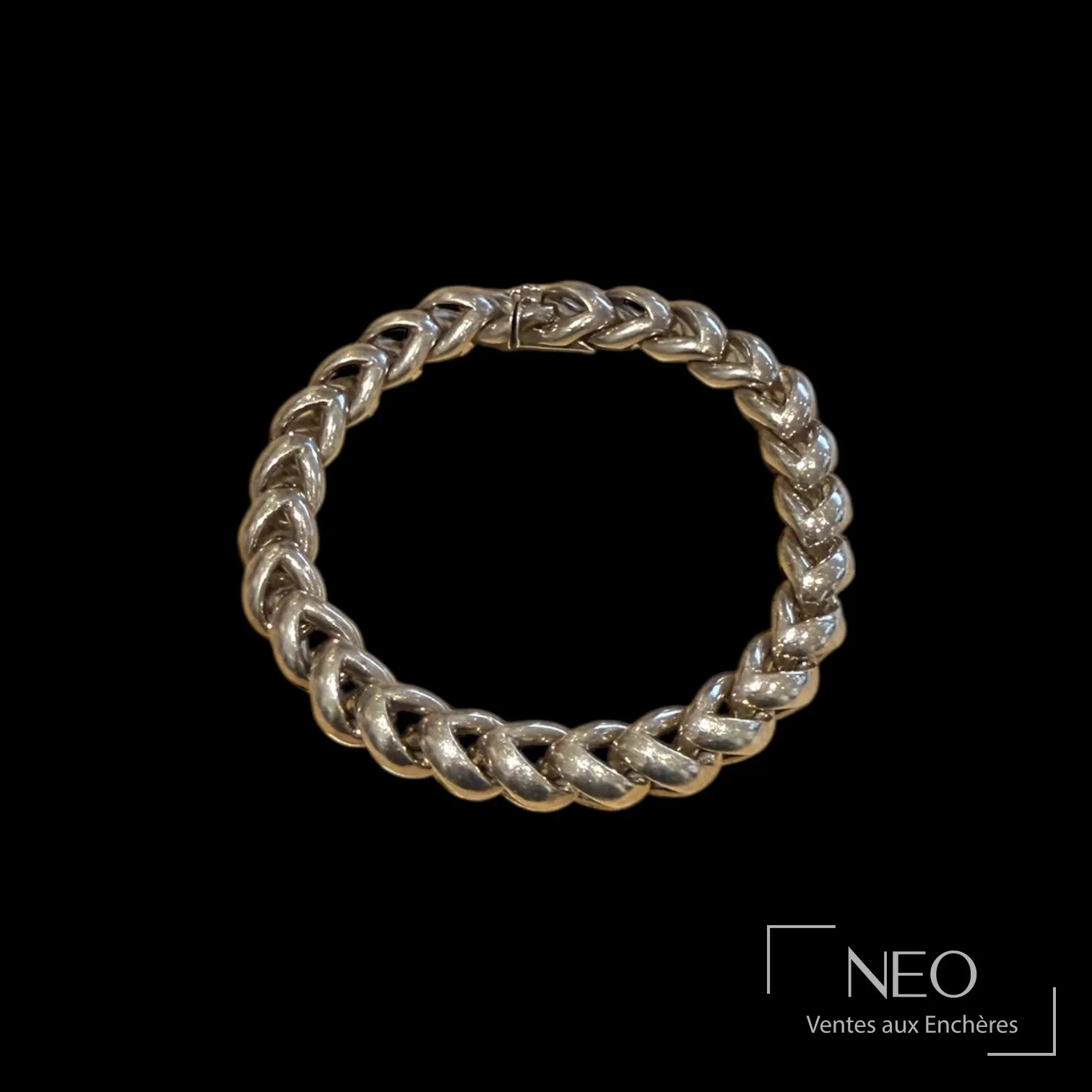 Bracelet torsade en argent Hermès Paris vers 1985, vue de face pour estimation de bijoux Hermès