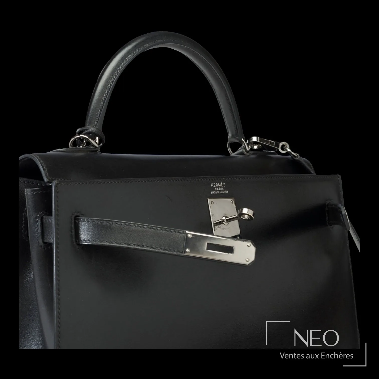 Sanglons, touret et plaques d'un sac Kelly sellier Hermès, quincaillerie finition canon de fusil