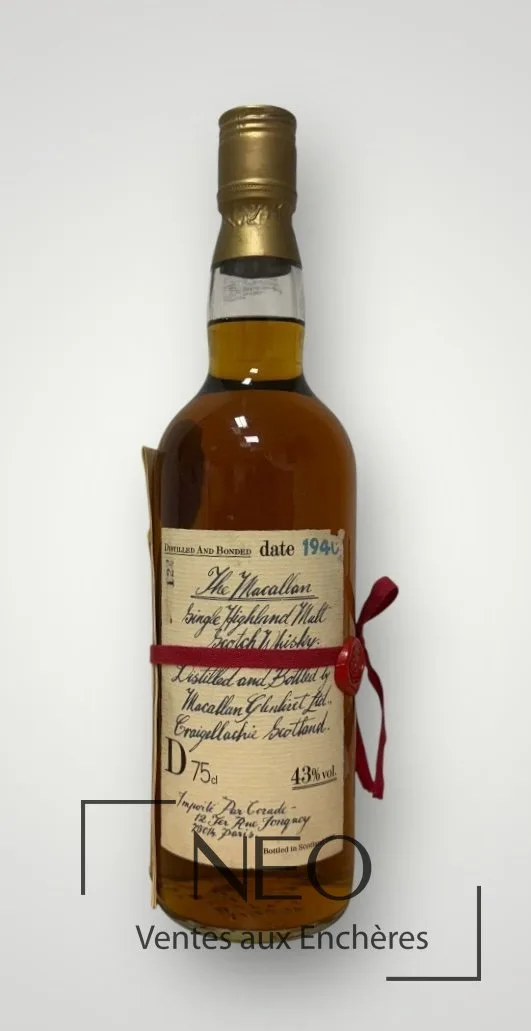 Whisky The Macallan Handwritten Label distillé en 1940, coffret bois et livret, vendu par NEO Enchères