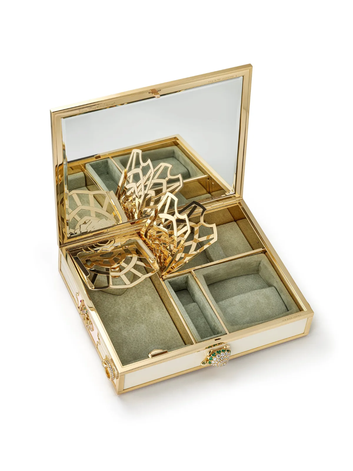Minaudière Van Cleef & Arpels ouverte montrant le miroir et les compartiments