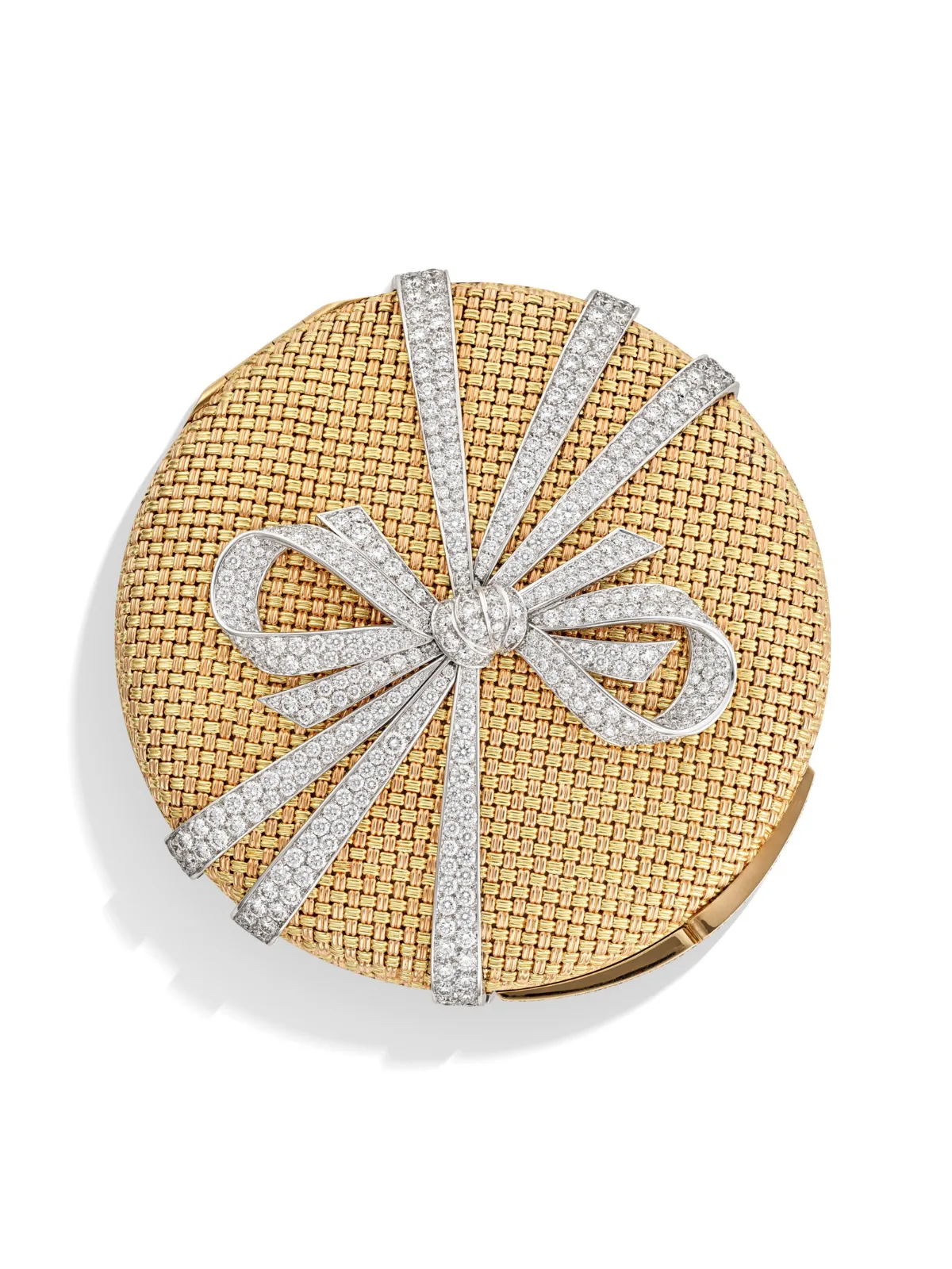 Poudrier rond Van Cleef & Arpels en or tressé orné d’un nœud de diamants